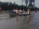 People Participate in a Canoe Race by KAIT-TV