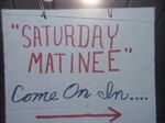 Children Attend Saturday Matinee by KAIT-TV