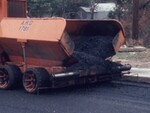 Construction Workers Fix Potholes by KAIT-TV