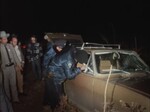 Police Remove Body from Wrecked Vehicle by KAIT-TV